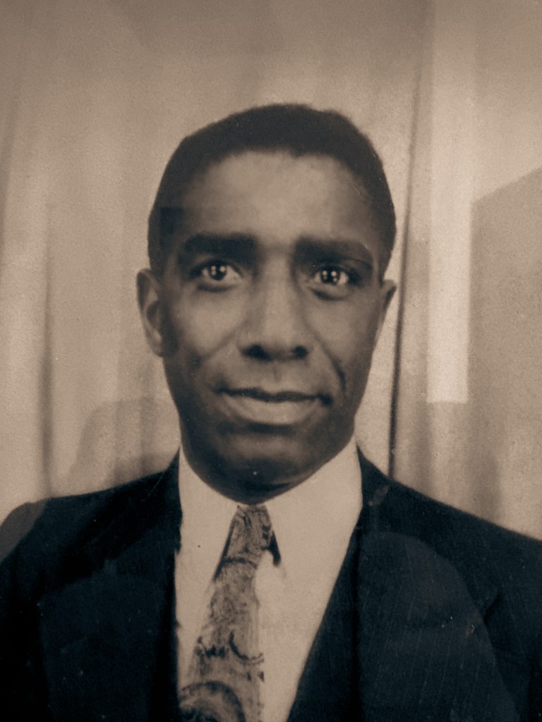 Black and White photo of a portrait of a Black man