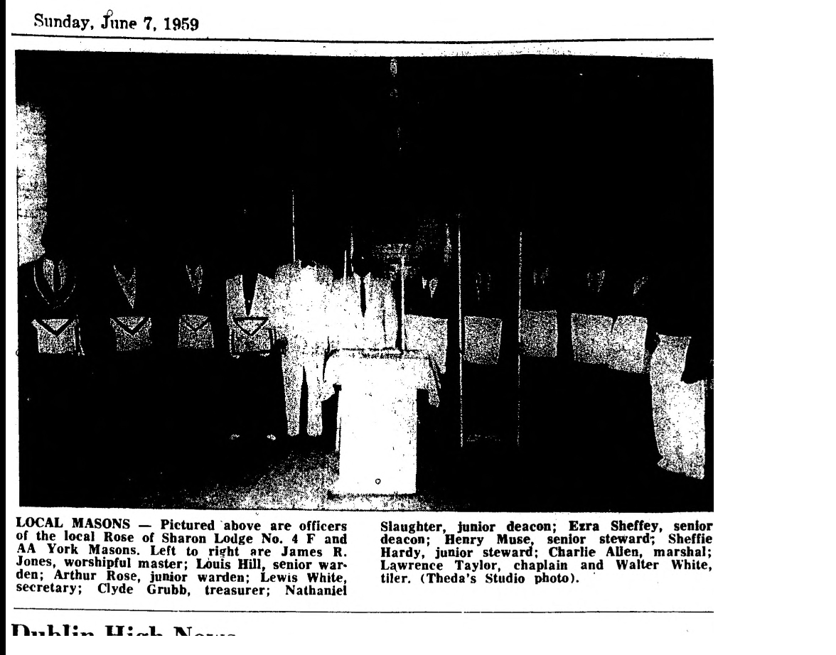 Grainy B&W article clipping on local masons; faces obscured by fading and poor print quality.