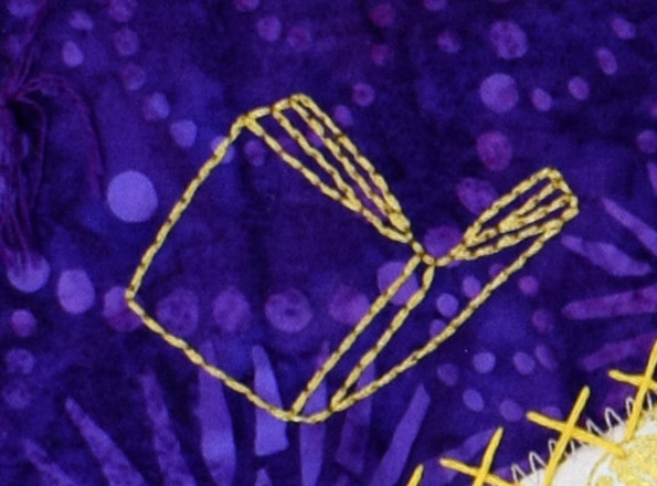 stitched line drawing of an open book