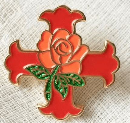 Red mason pin with a pink rose in the center