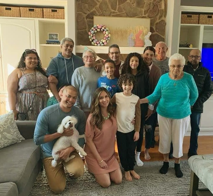 a family photo taken in a living room