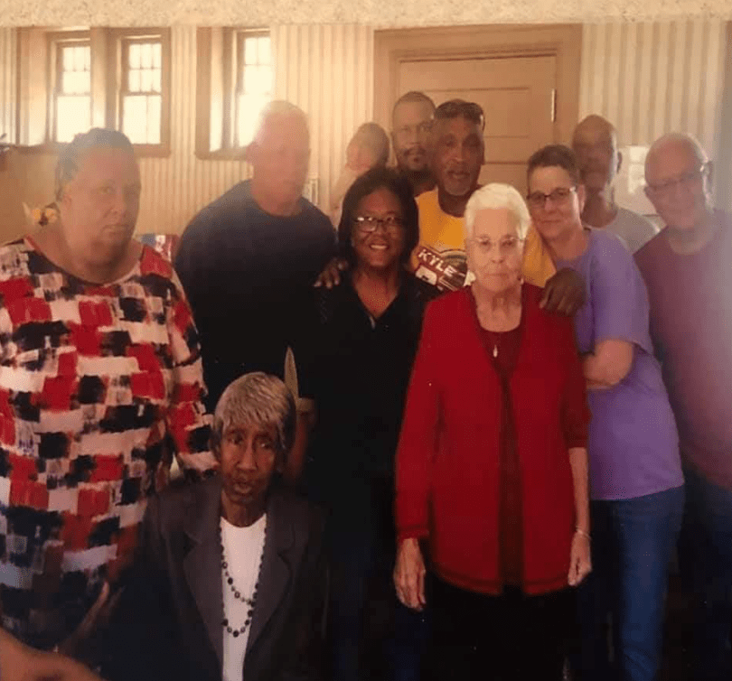 a family photo taken in a public place