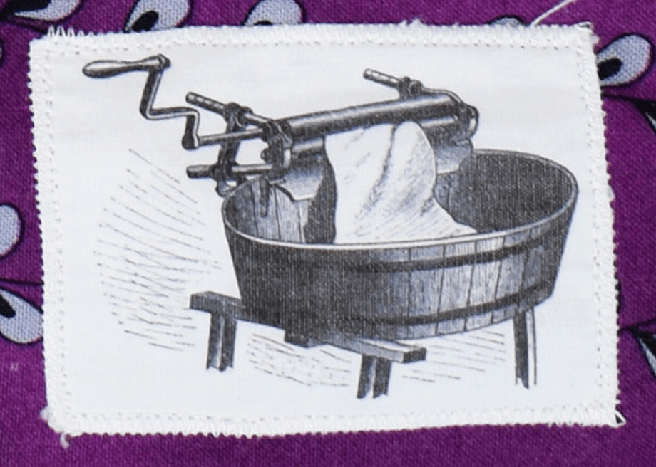 Sketch of wringer stitched onto quilt